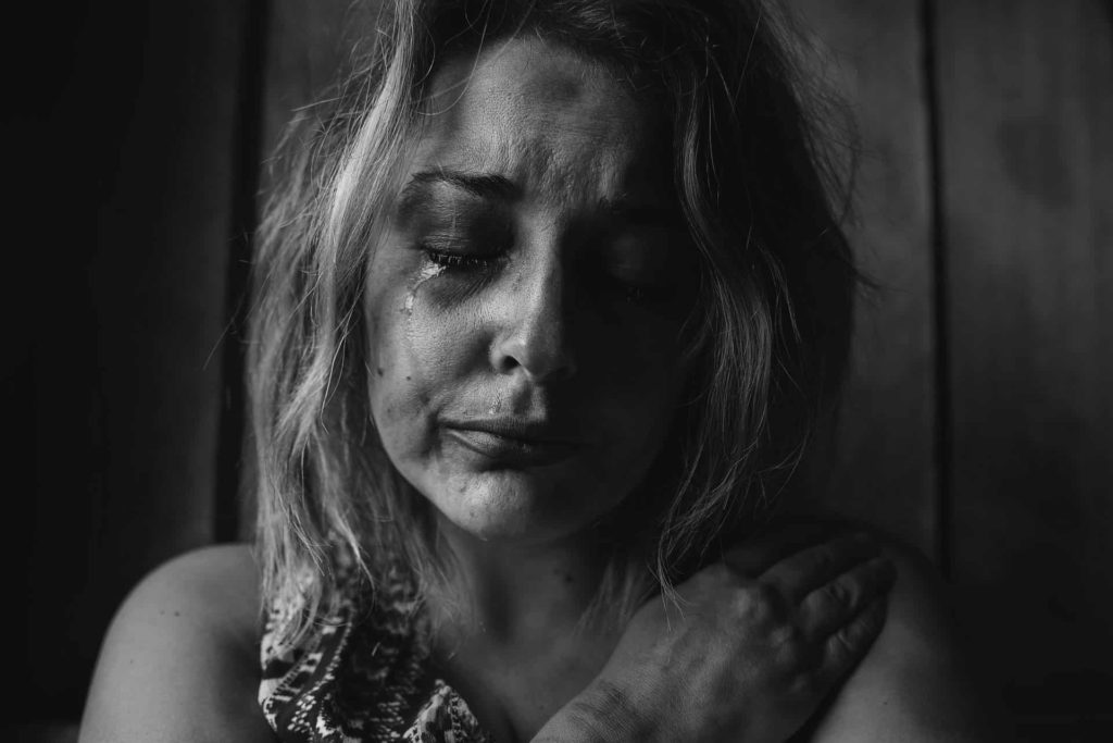 portrait photo of woman crying