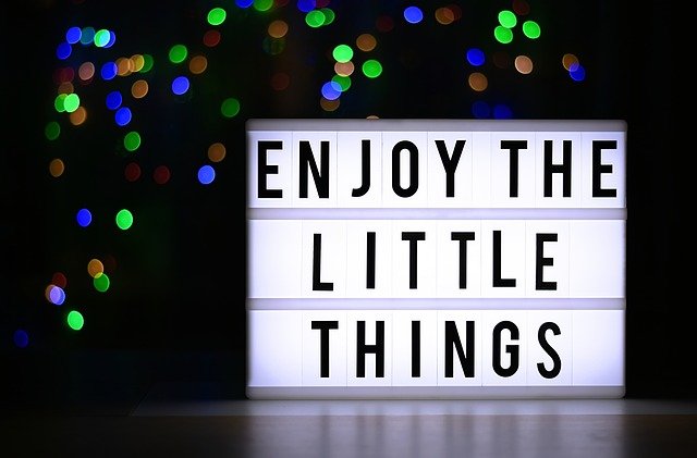 enjoy the little things written down on neon 