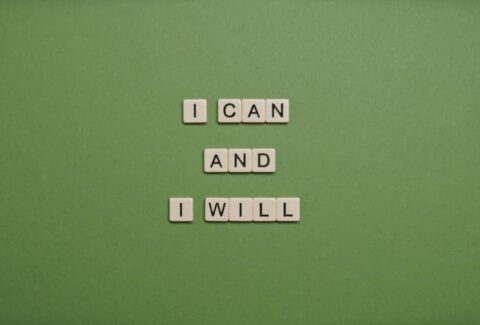 I can and I will written down by scrabble on a green background