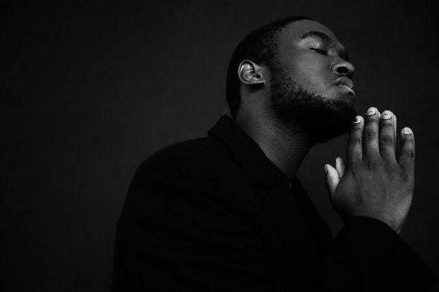 Black man practicing gratitude to be open to receive abundance